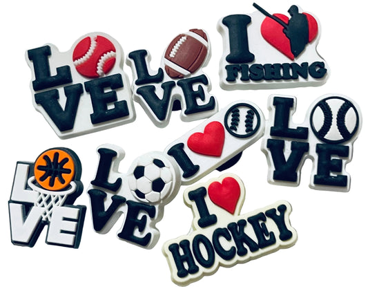 Collection of 'I love' themed pins with sports symbols on a white background