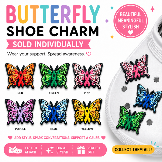 Butterfly shoe charms with colorful designs on a white background
