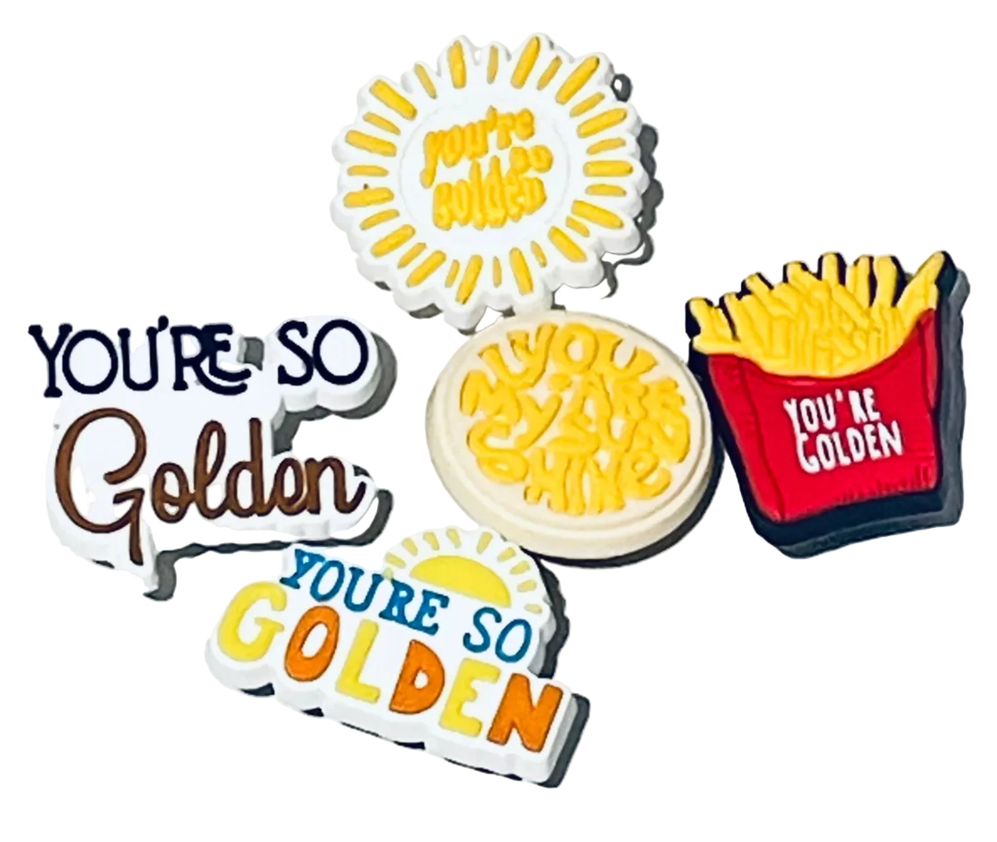 Set of 'You're So Golden' themed pins on a light gray background