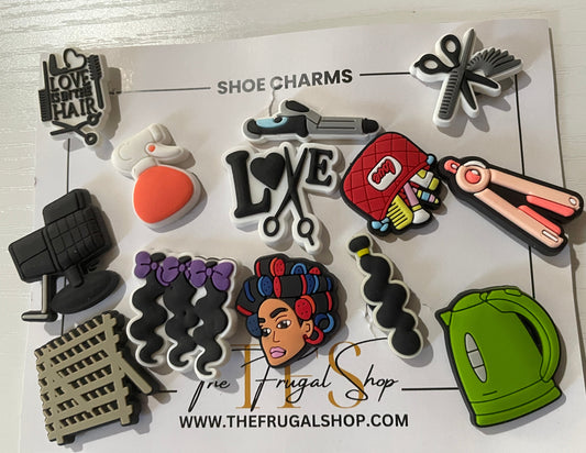Collection of shoe charms on a card with 'The Frugal Shop' branding.