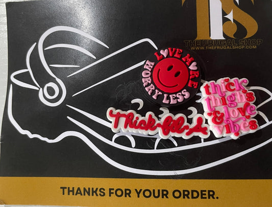 Sticker with a smiley face and text on a black background