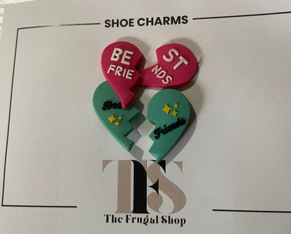 Two heart-shaped shoe charms on a card from The Frugal Shop