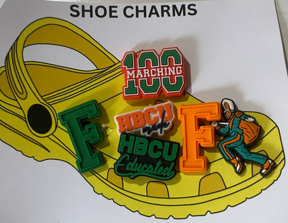 Shoe charms with colorful designs on a yellow shoe-shaped card labeled 'SHOE CHARMS'.
