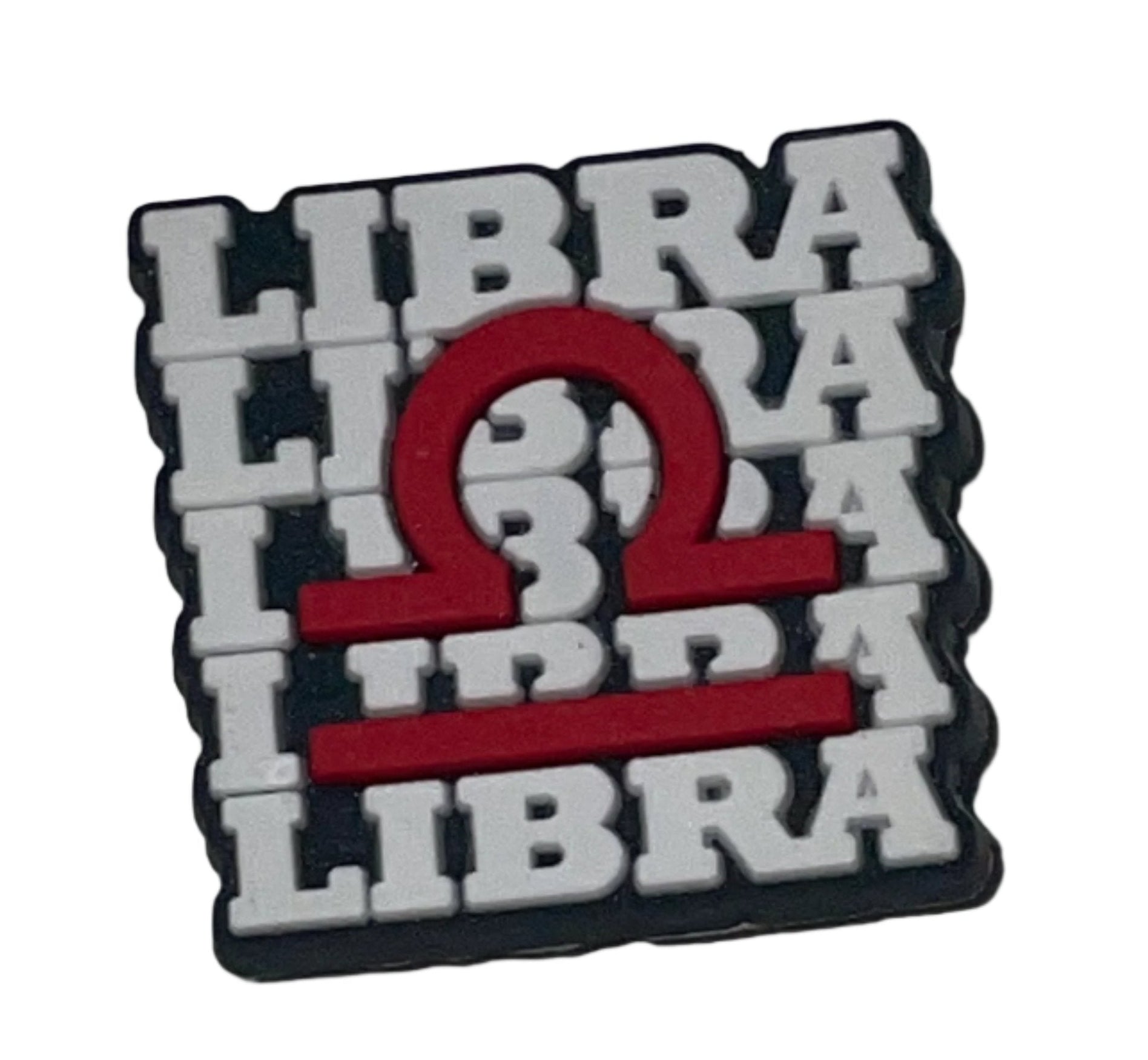 A shoe charm featuring the word 'LIBRA' alongside a symbol representing the zodiac sign Libra.
