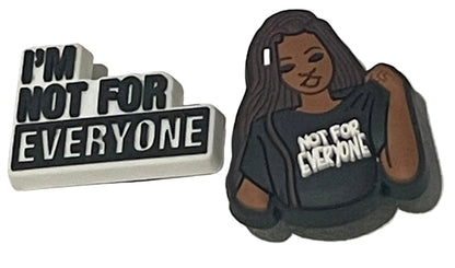 Decorative pick with a figure wearing a cap and text 'Not for Everyone' on a light gray background