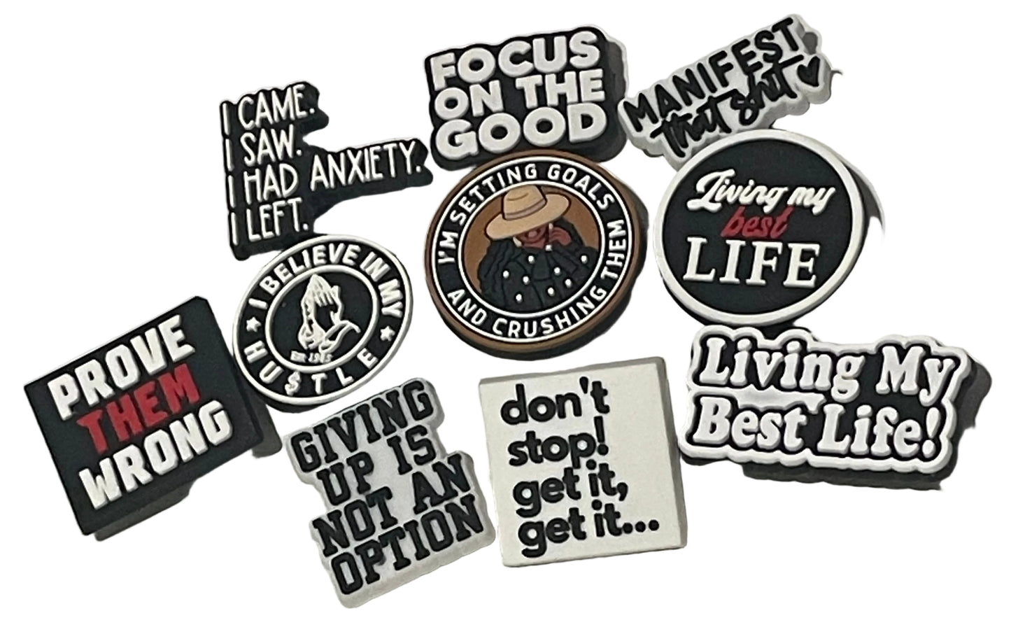 Collection of motivational stickers on a light gray background