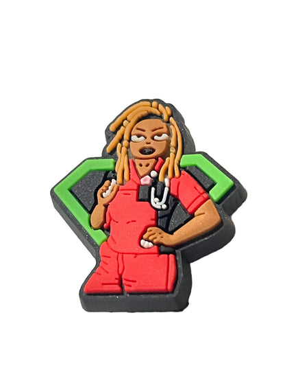 Colorful figurine of a person with braided hair on a light gray background