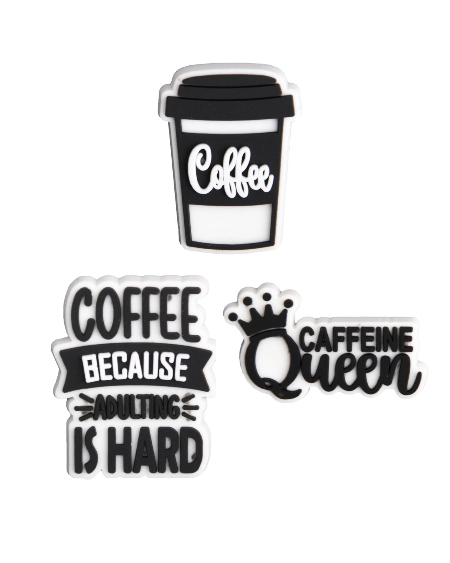 Three shoe charms with coffee-themed text and a crown graphic, designed for insertion into the holes of shoes.